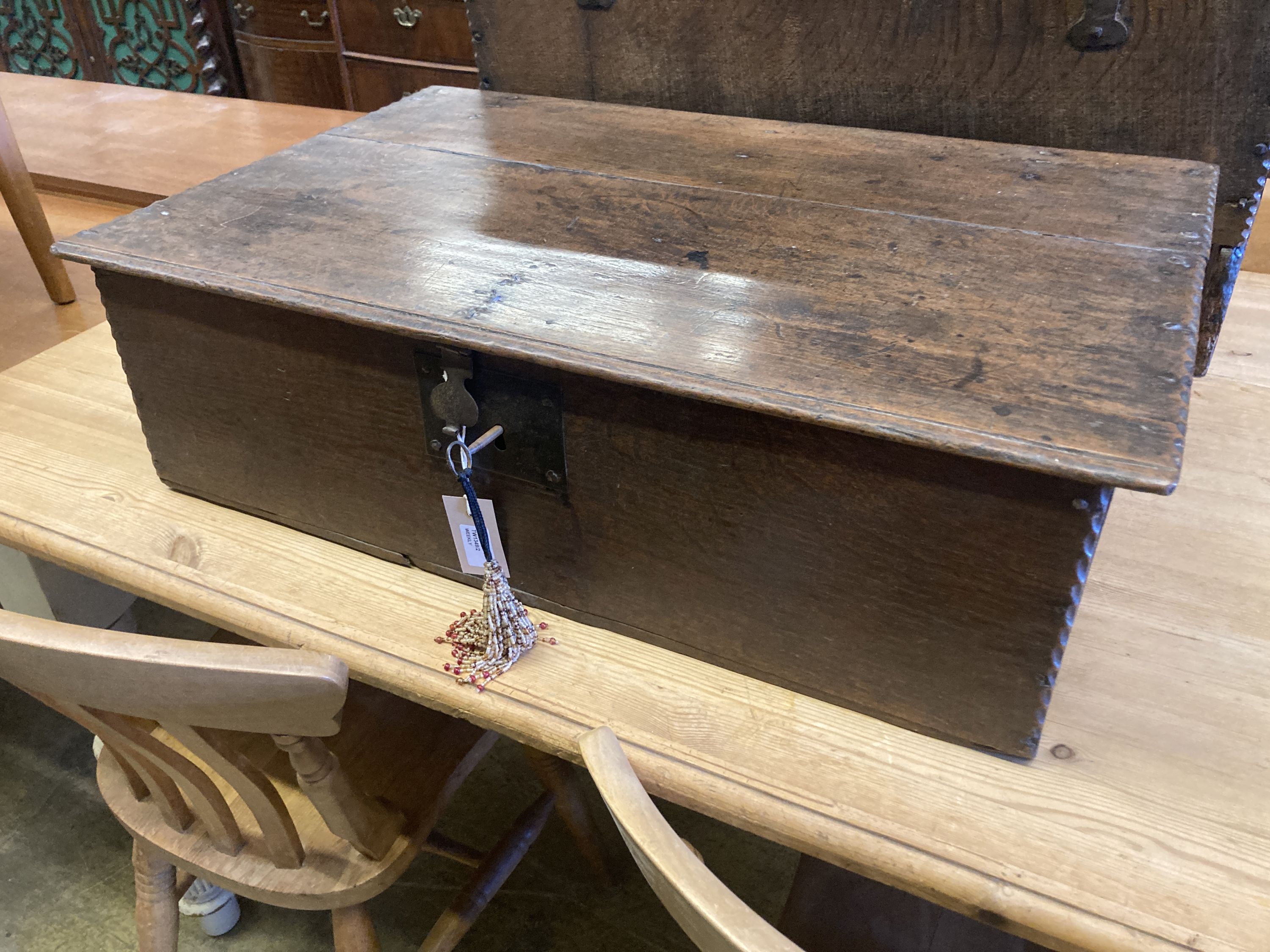 An 18th century oak bible box of plain rectangular form, width 74cm, depth 48cm, height 21cm